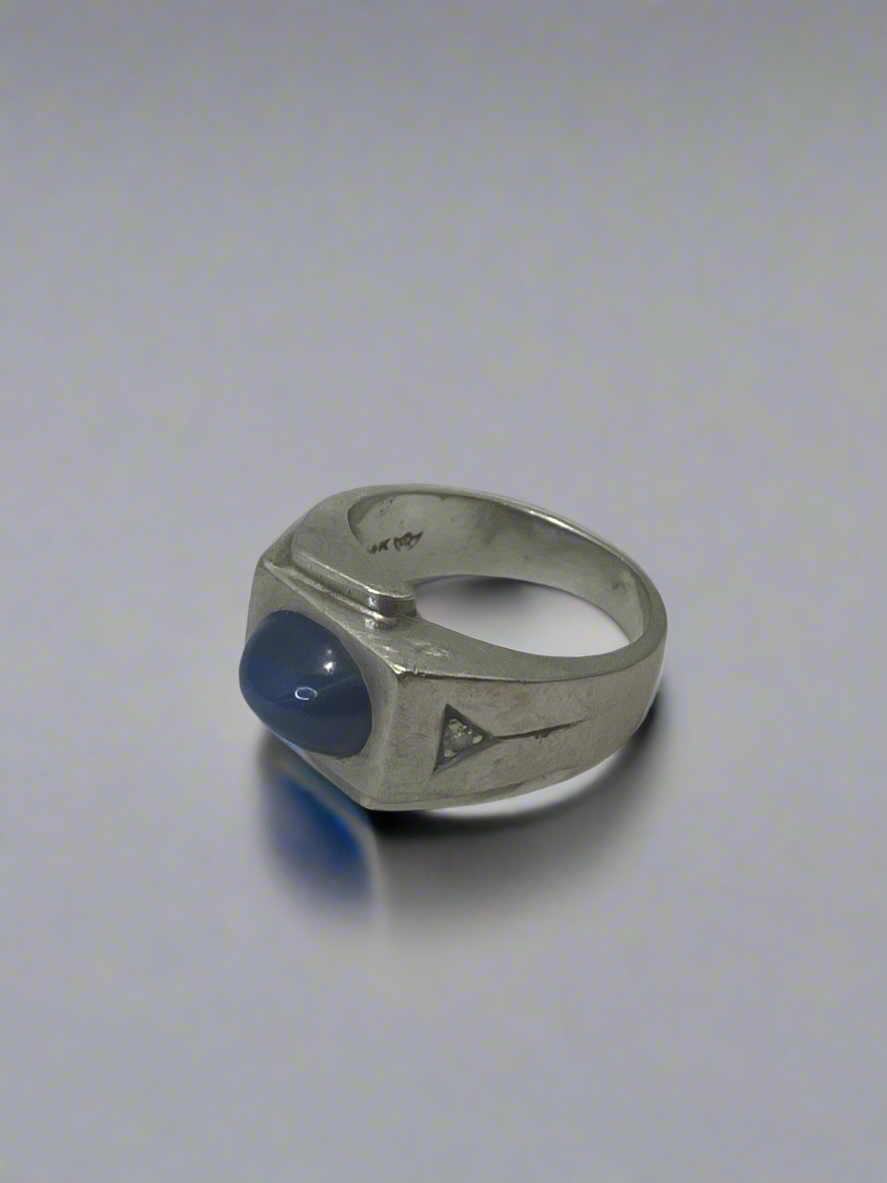 14k sterling silver ring with lab created star sapphire and cubic zirconias