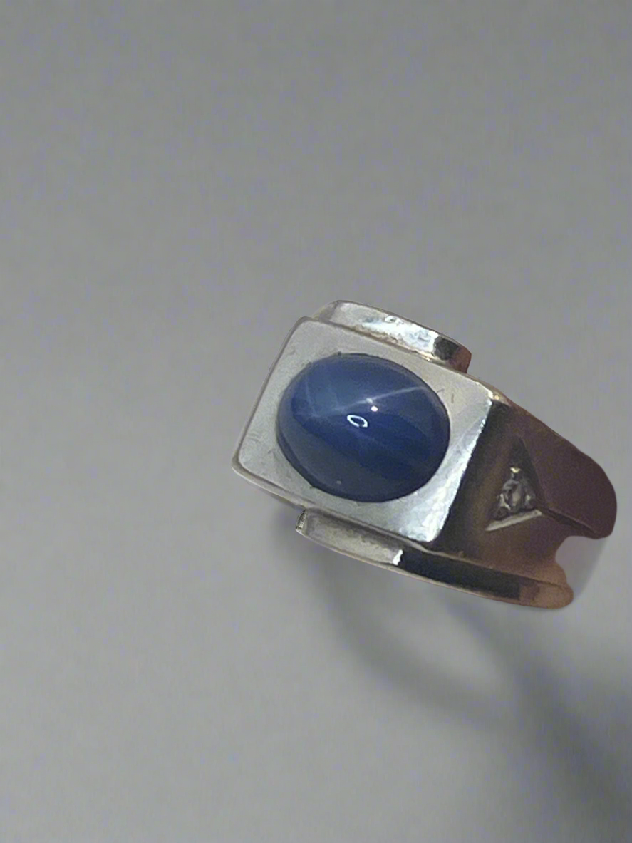 14k sterling silver ring with lab created star sapphire and cubic zirconias
